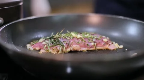 Meat with greens fried in a pan Stock Footage 67863176