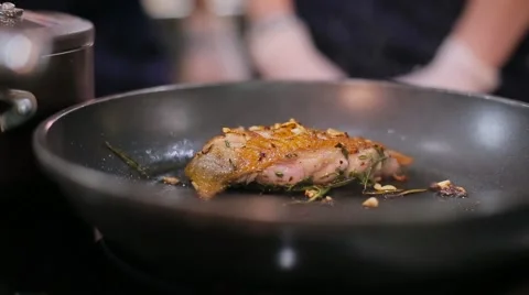Meat with greens fried in a pan Stock Footage 67863211