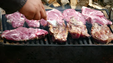 Meat on the grill, 4k Stock Footage 68376339