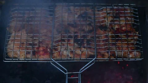 Meat on the grill, barbecue Stock Footage 168669226