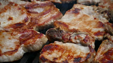 Meat on the grill, Closeup, Slow motion Stock Footage 68367293