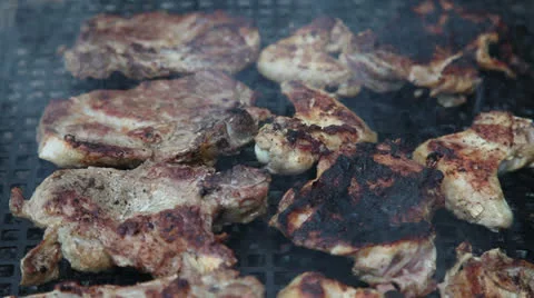 Meat on grill Stock Footage 24729391