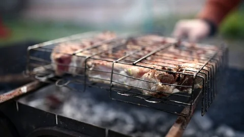 Meat on grill Stock Footage 107424484