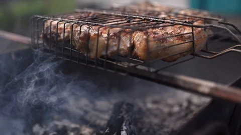 Meat on grill Stock Footage 107424485