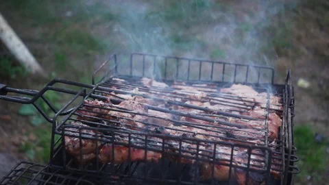 Meat on grill Stock Footage 117908434