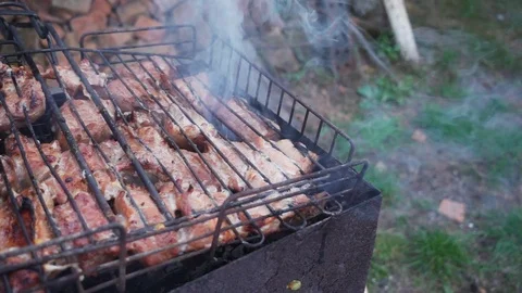 Meat on grill Stock Footage 117908823