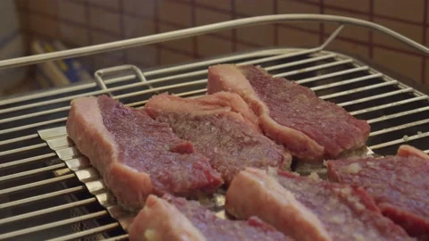 Meat on the grill Stock Footage 130266459