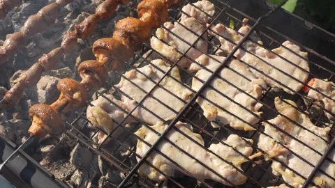 Meat on the grill is fried outside Stock Footage 318713286