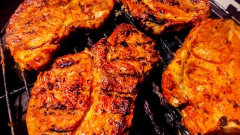 Meat on a grill Stock Photos