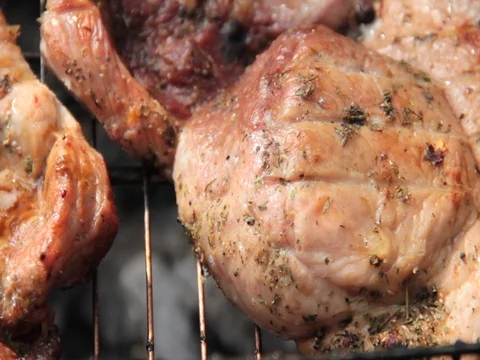 The meat on the grill is roasting Stock Footage 78228011