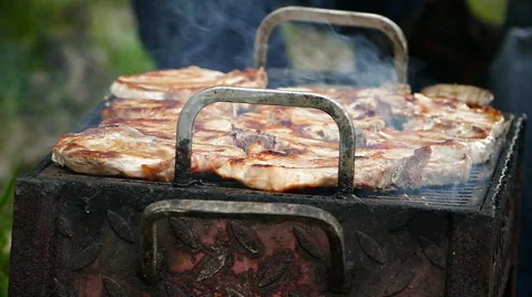Meat on the grill, Slow motion Stock Footage 68367211