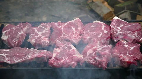 Meat on the grill, Slow motion Stock Footage 68367785