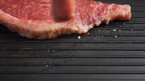 Meat on the grill turning using the spatula slow motion. marble beef. Stock Footage 115830531