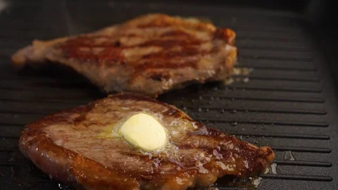 Meat on the grill turning using the spatula slow motion. marble beef. Stock Footage 115830636