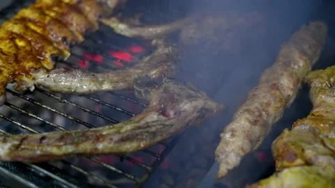 The meat is grilled on coals.  Stock Footage 146171584