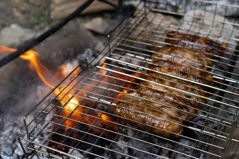 The meat is grilled on the fire Stock Photos