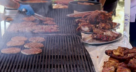 The meat is grilled on the grill and open fire. Stock Footage 269139449