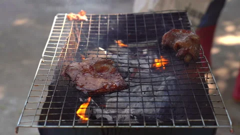 Meat grilling fire flame on party background for cooking, close up view Vídeos de archivo 145844792