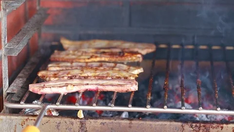 Meat grilling on the grid Stock Footage 91724387