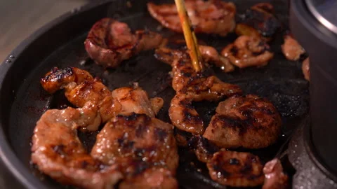 Meat grilling on hot pan for cooking Stock Footage 152865655
