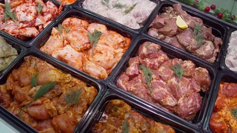 Meat for grilling or barbecuing at the store counter Stock Footage 301388375
