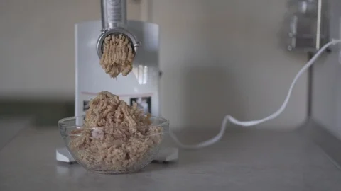 Meat is grinded into minced meat Stock Footage 104602476