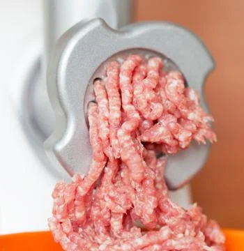 Meat grinder close up, preparation of forcemeat Fotos Stock