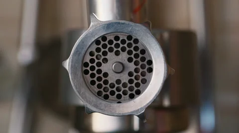 Meat grinder grinds minced Stock Footage 53587104