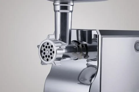 Meat grinder on a light background Stock Photos
