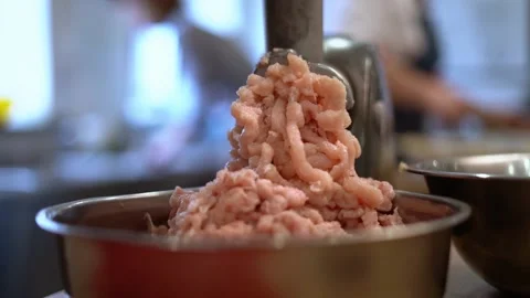 A meat grinder makes minced meat from fresh meat. Stock Footage 159366108