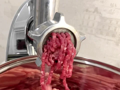 The meat grinder makes minced meat Stock Footage 257824557
