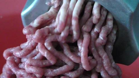 Meat grinder processes meat into minced meat Stock Footage 164037902
