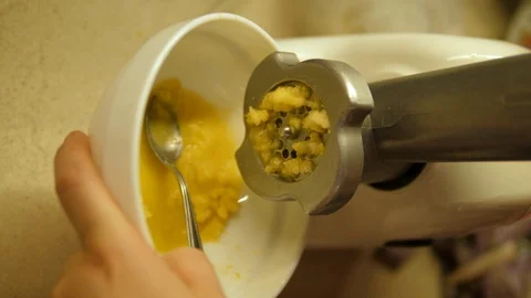 Meat Grinder used for Ginger. KitchenCraft household manual Hand Crank vegetable Stock Footage 129453610