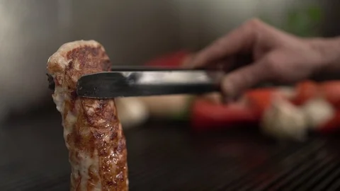 Meat Loaf Held on the Grill HD Stock Footage 88598219