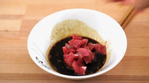 Meat in marinade Stock Footage 35856796