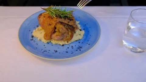 Meat with mashed potatoes in a plate. Close-up, selective focus. Video stock 227397877