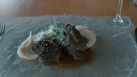 Meat with mashed potatoes in a plate. Close-up, selective focus. Stock Footage 238944452