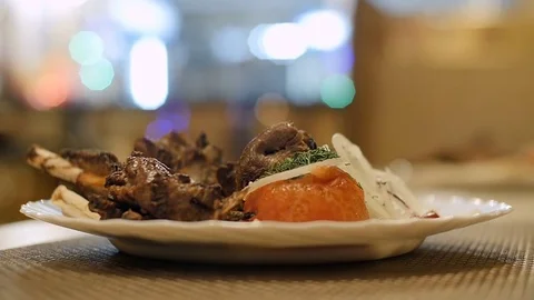 Meat meal is on the table. Bokeh Stock Footage 73035065