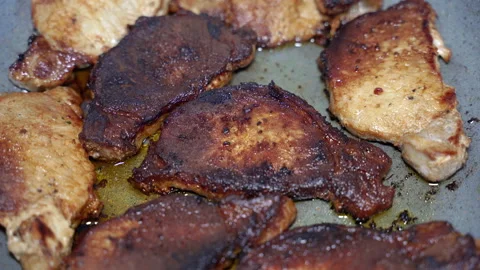 Meat. The meat is fried in a pan. Stock Footage 232966664