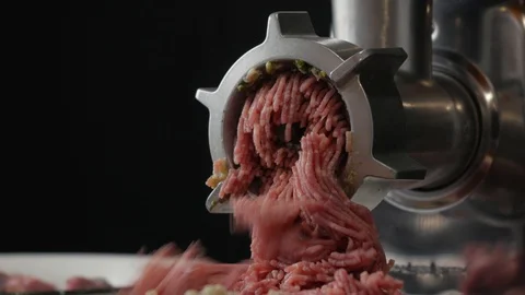 Meat in minced meat grinder, throw meat into a meat grinder Stock Footage 126822148