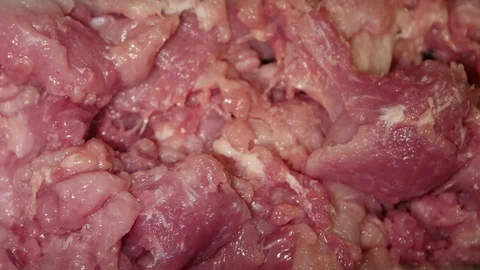 Meat mincing machine grinding meat in a meat processing factory Stock Footage 114658224
