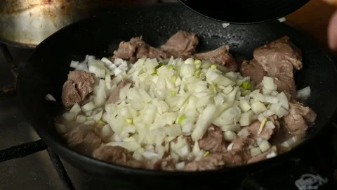 Meat with onions Stock Footage 175424996