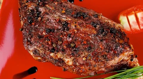 Meat over white : grlled meat shoulder on red plate Vídeos de archivo 58806445