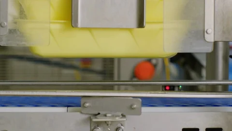 Meat packaging trays that fall on the production belt 4k Stock Footage 86854003