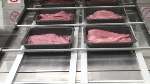 Meat is packed in the machine Stock Footage 44265649
