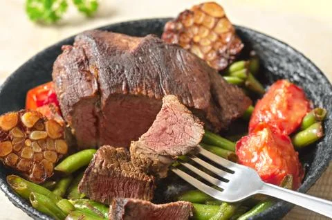 Meat pan-fried with vegetables. Selective focus Foto stock