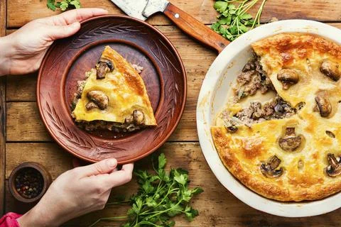 Meat pie with champignon Stock Photos