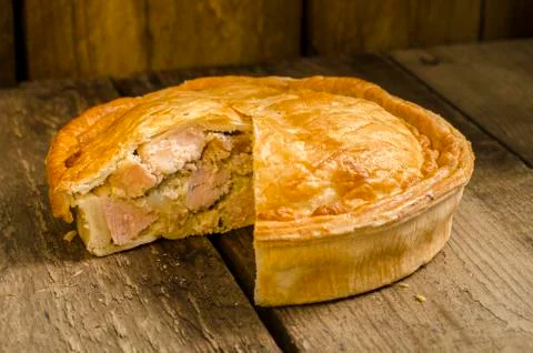 Meat Pie with a Slice Missing Stock Photos