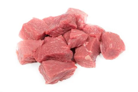 Meat pieces on a white background. Studio shot Stock Photos