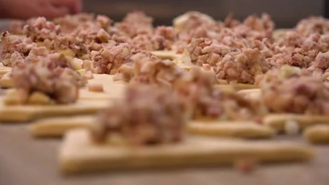 Meat Pies being prepared for baking Video stock 239739928